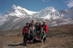 
After about two hours the clouds started to cover Everest’s face, so the four of us decided to head back. We walked to the British Camp and were surprised to meet Shane, Jan, Ben, Rajin, and Tashi sitting and talking to the British Camp Nepalese. We took another team photo: Gerhardt, Rajin, Jerome Ryan, Tashi, Ram, Chris, Jan, Ben and Shane with Chomolonzo and Makalu behind.
